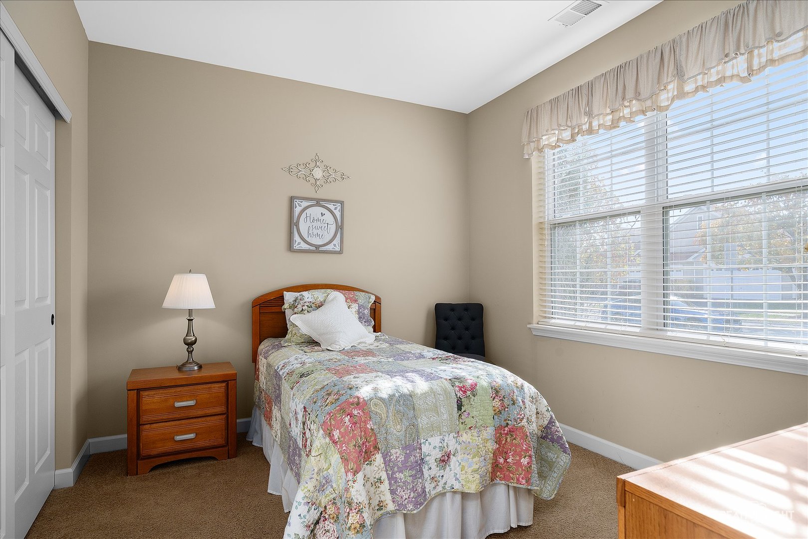 757 Bellevue Circle Oswego, IL 60543 - Photo 4 of 19 a bedroom with a bed and a window