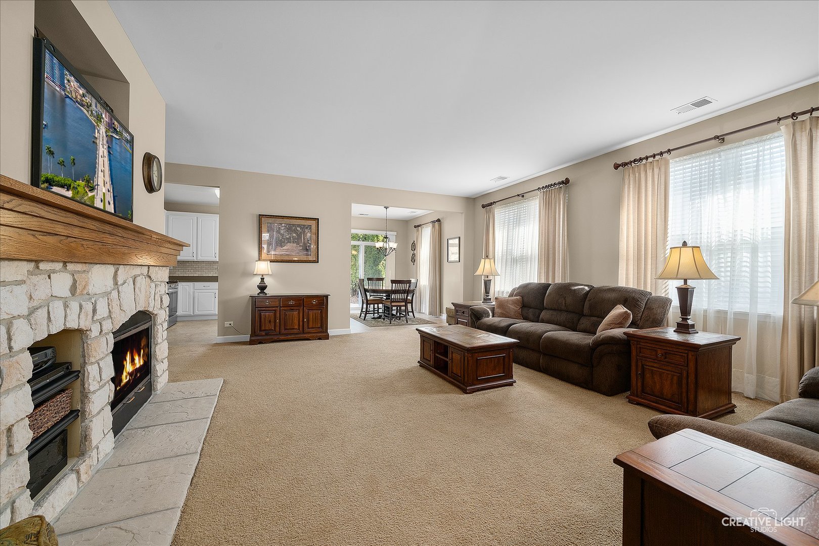 757 Bellevue Circle Oswego, IL 60543 - Photo 6 of 19 a living room with furniture and a fireplace