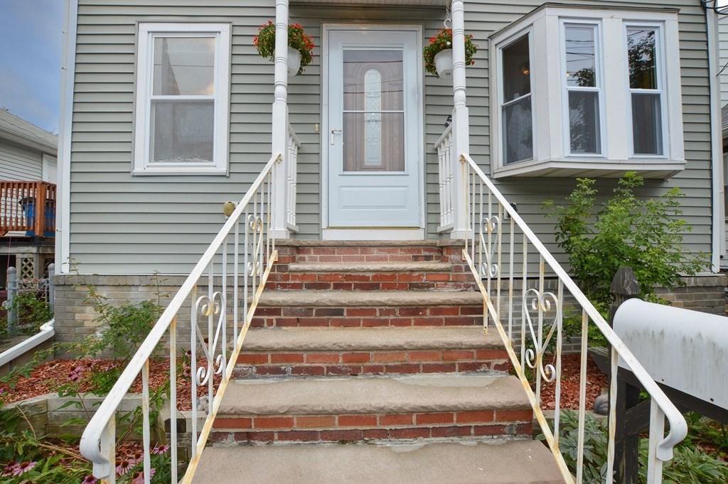 56 Curtis Road Revere, MA 02151 - Photo 3 of 22 a view of entryway with a front door