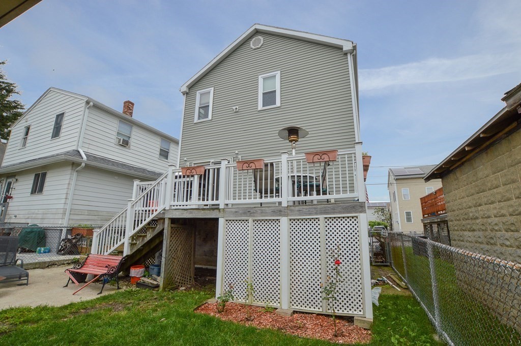56 Curtis Road Revere, MA 02151 - Photo 10 of 22 a front view of a house with a yard