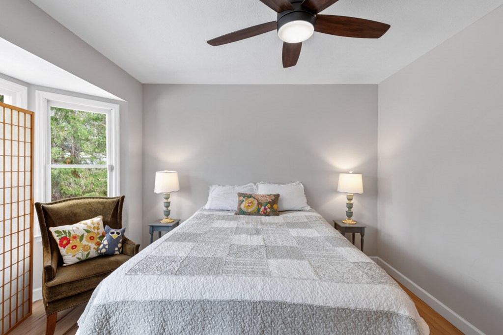 1682 Settlement Road Young Harris, GA 30582 - Photo 34 of 72 a bedroom with a bed and window