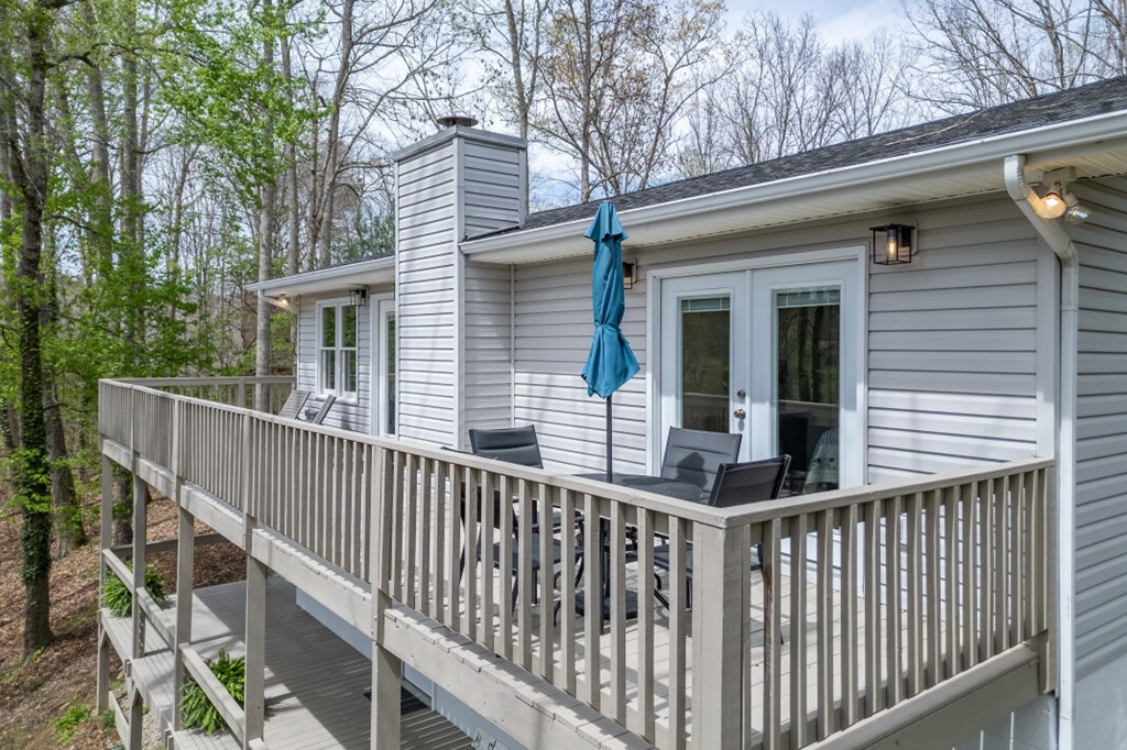 1682 Settlement Road Young Harris, GA 30582 - Photo 39 of 72 a view of a house with a wooden fence