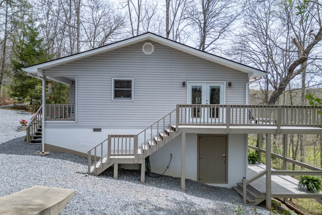 1682 Settlement Road Young Harris, GA 30582 - Photo 43 of 72 a front view of a house with balcony