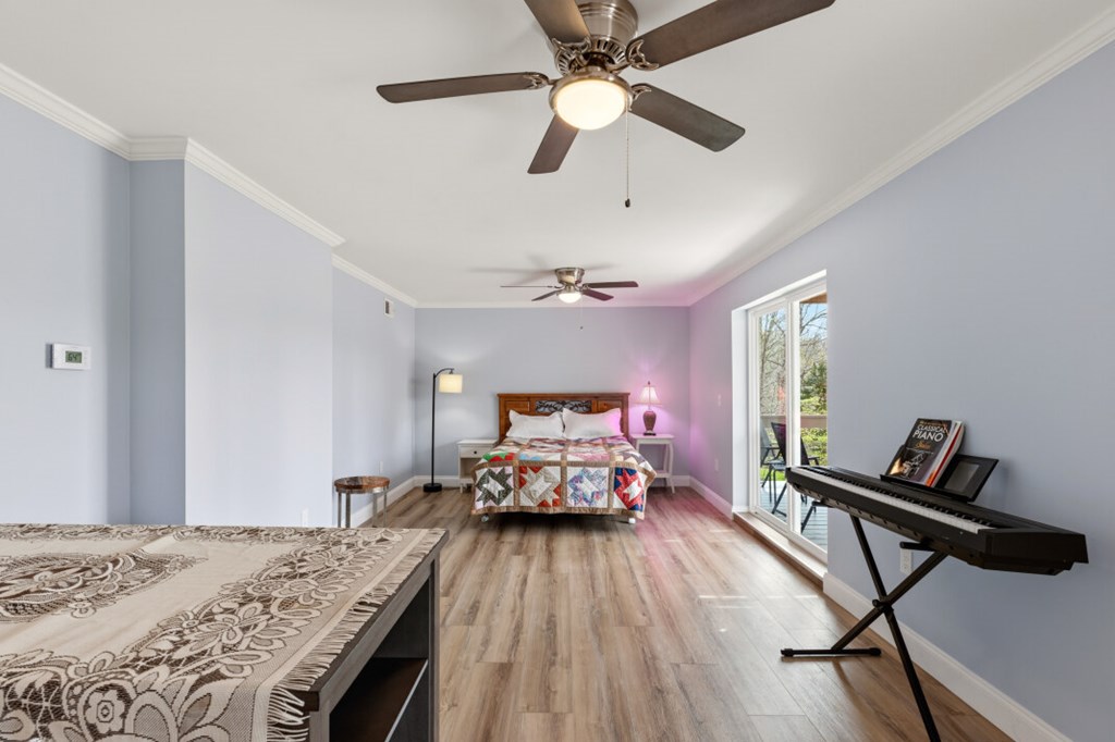 1682 Settlement Road Young Harris, GA 30582 - Photo 53 of 72 a living room with furniture and a wooden floor
