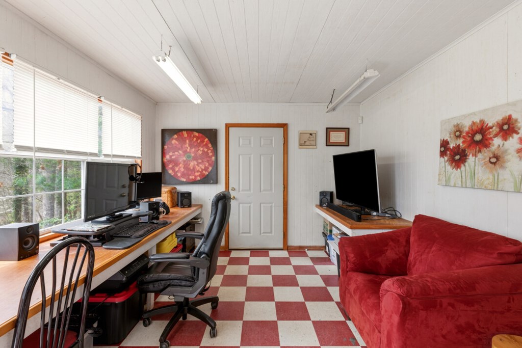 1682 Settlement Road Young Harris, GA 30582 - Photo 57 of 72 a view of a livingroom with workspace and a window