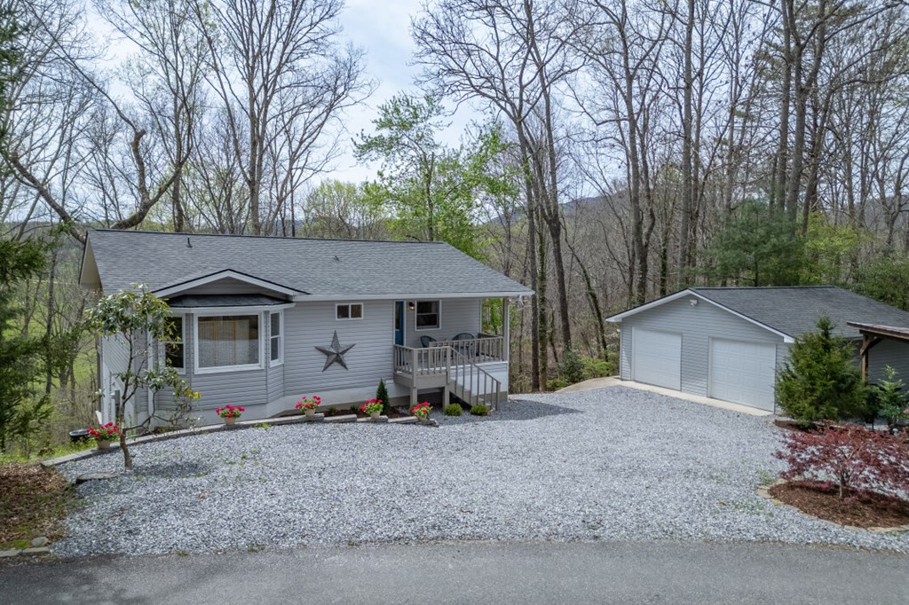 1682 Settlement Road Young Harris, GA 30582 - Photo 65 of 72 a view of a house with a yard and large tree