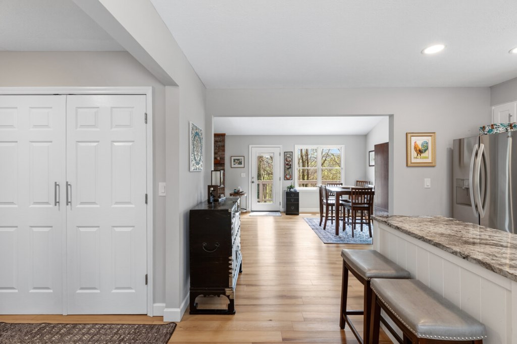 1682 Settlement Road Young Harris, GA 30582 - Photo 7 of 72 a view of a a dining room with furniture window and wooden floor