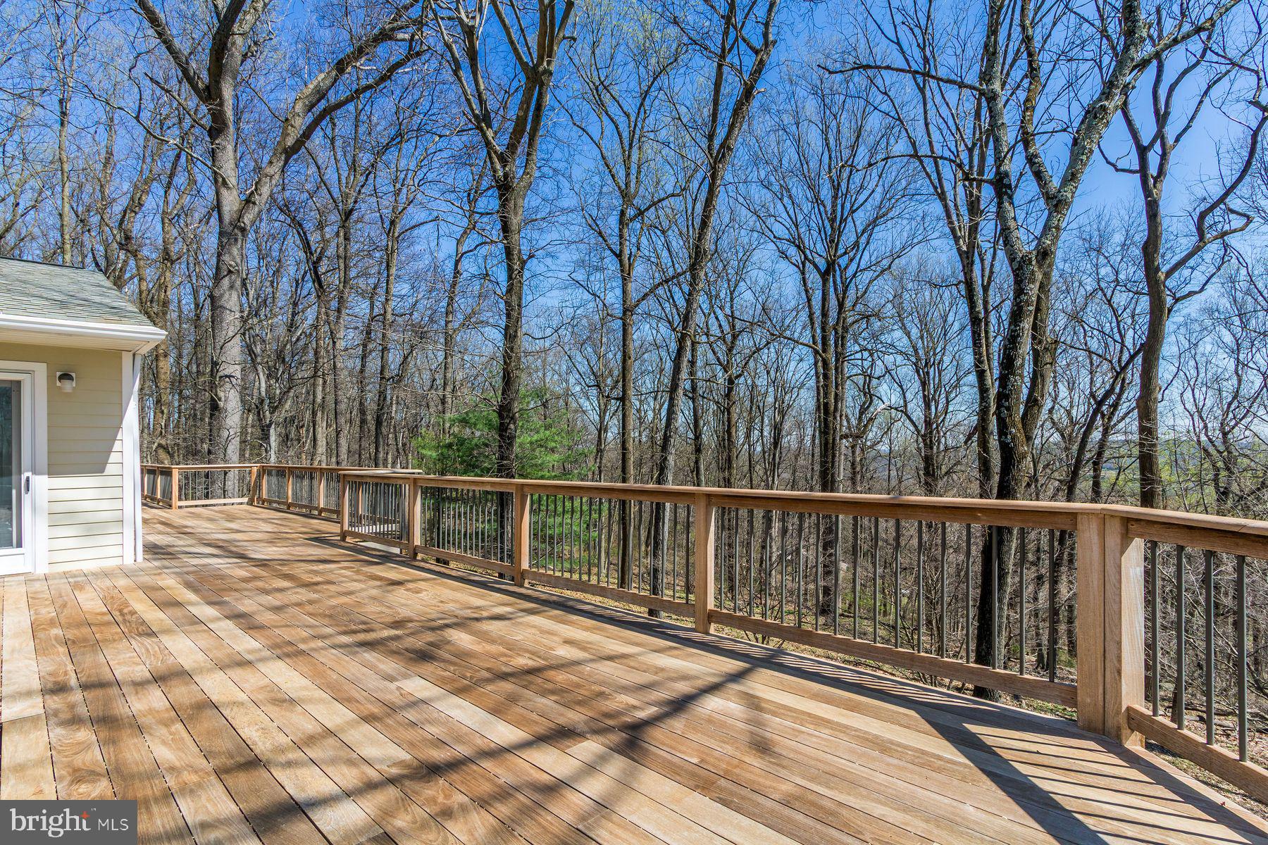20 Solebury Mountain Road New Hope, PA 18938 - Photo 31 of 43 a view of balcony with wooden floor and fence