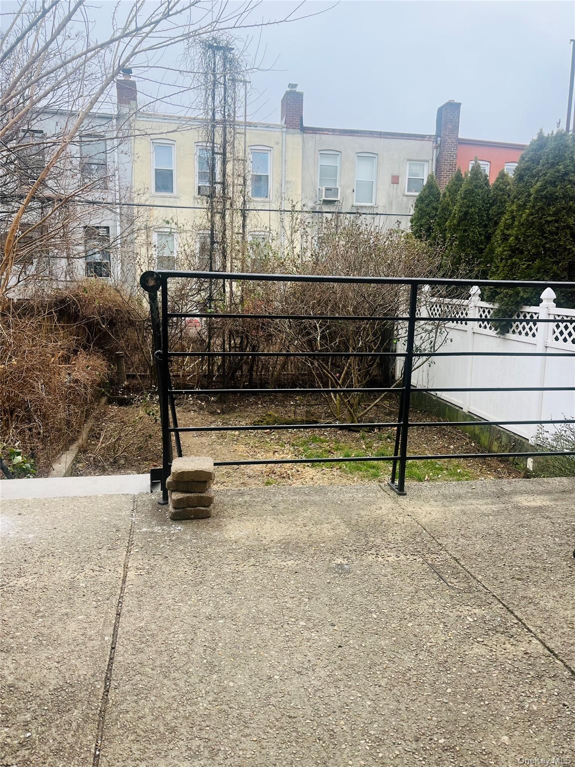 62-18 60th Drive Queens, NY 11378 - Photo 14 of 14 View of gate