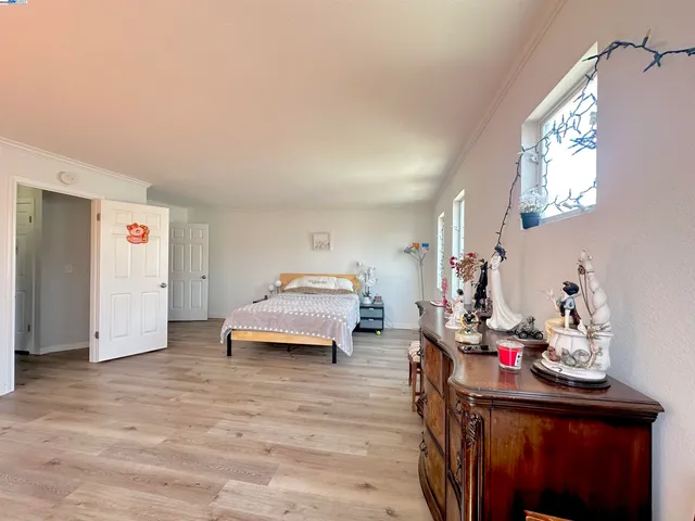 a bathroom with a sink mirror toilet and shower