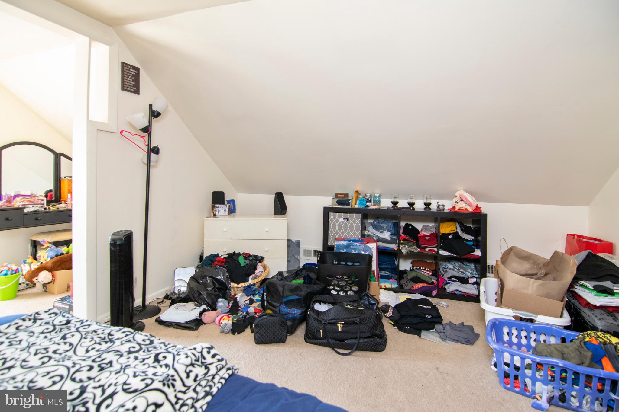 8438 Church Road Pasadena, MD 21122 - Photo 25 of 25 a bedroom with furniture and a closet