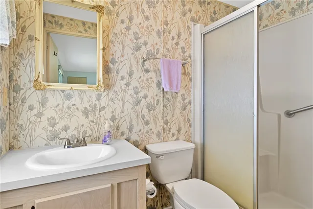 a bathroom with a sink and a toilet