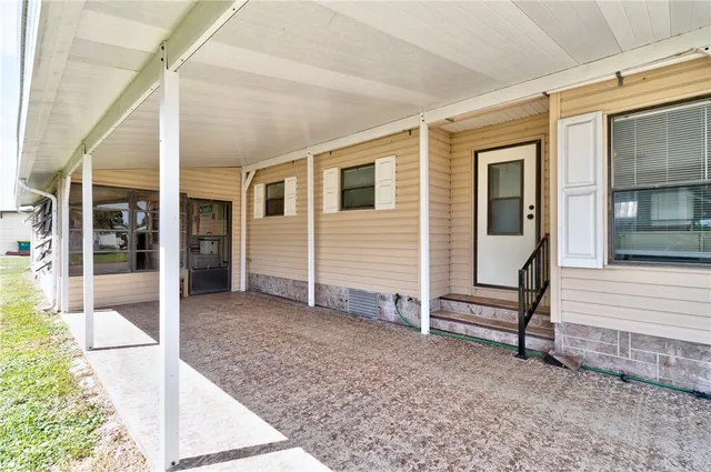 a view of house with patio