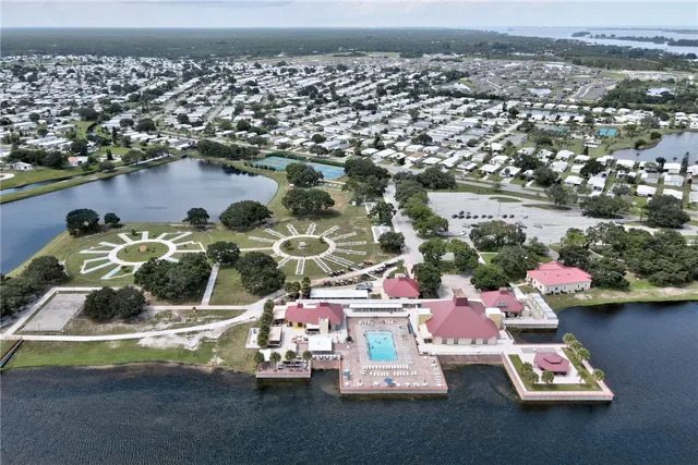 an aerial view of a houses with outdoor space
