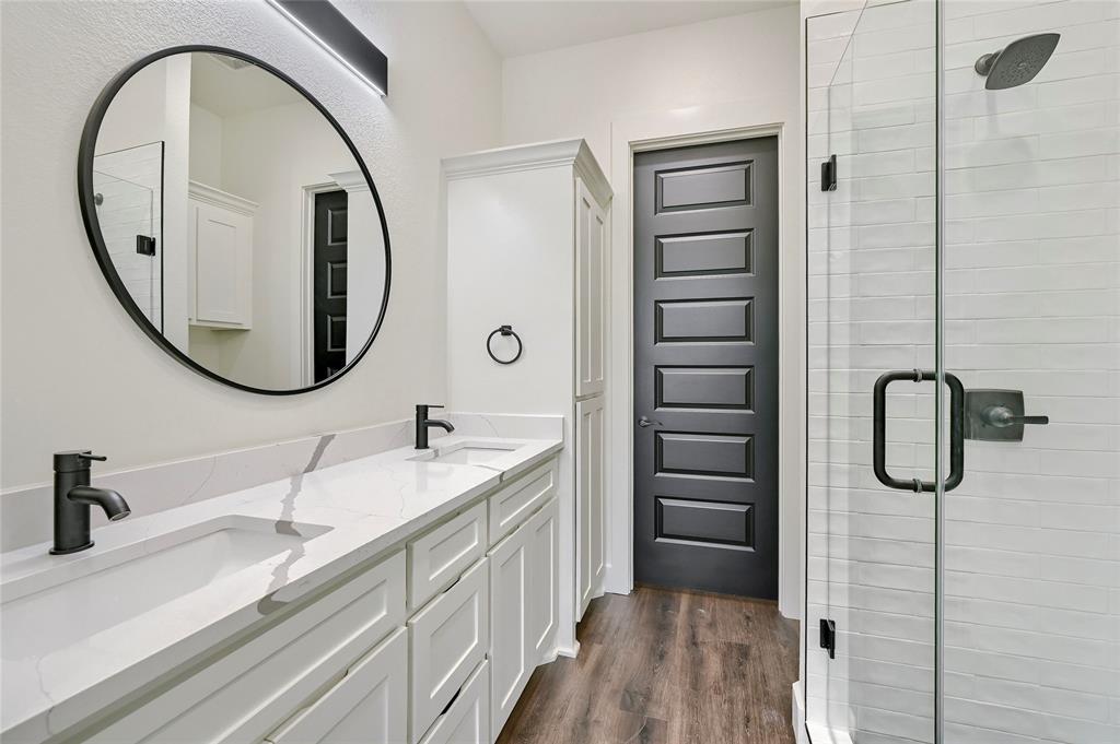 6091 Fm-1753 Denison, TX 75021 - Photo 18 of 40 a bathroom with a sink and a mirror