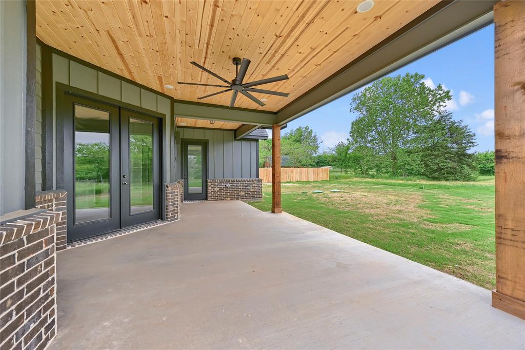 6091 Fm-1753 Denison, TX 75021 - Photo 33 of 40 a porch with a garden view