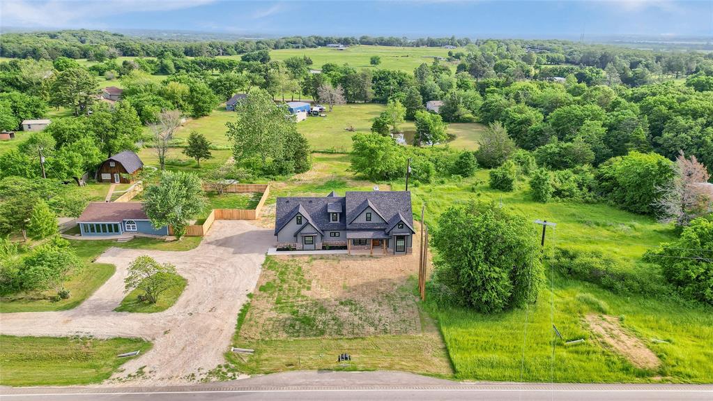 6091 Fm-1753 Denison, TX 75021 - Photo 35 of 40 a view of a yard with an outdoor seating