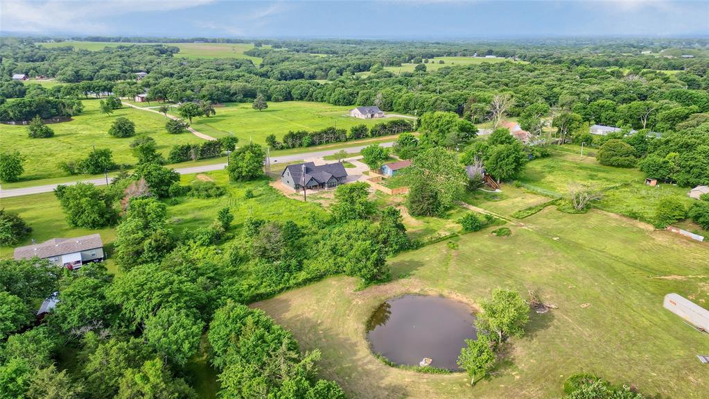 6091 Fm-1753 Denison, TX 75021 - Photo 39 of 40 a view of a back yard of the green and green space