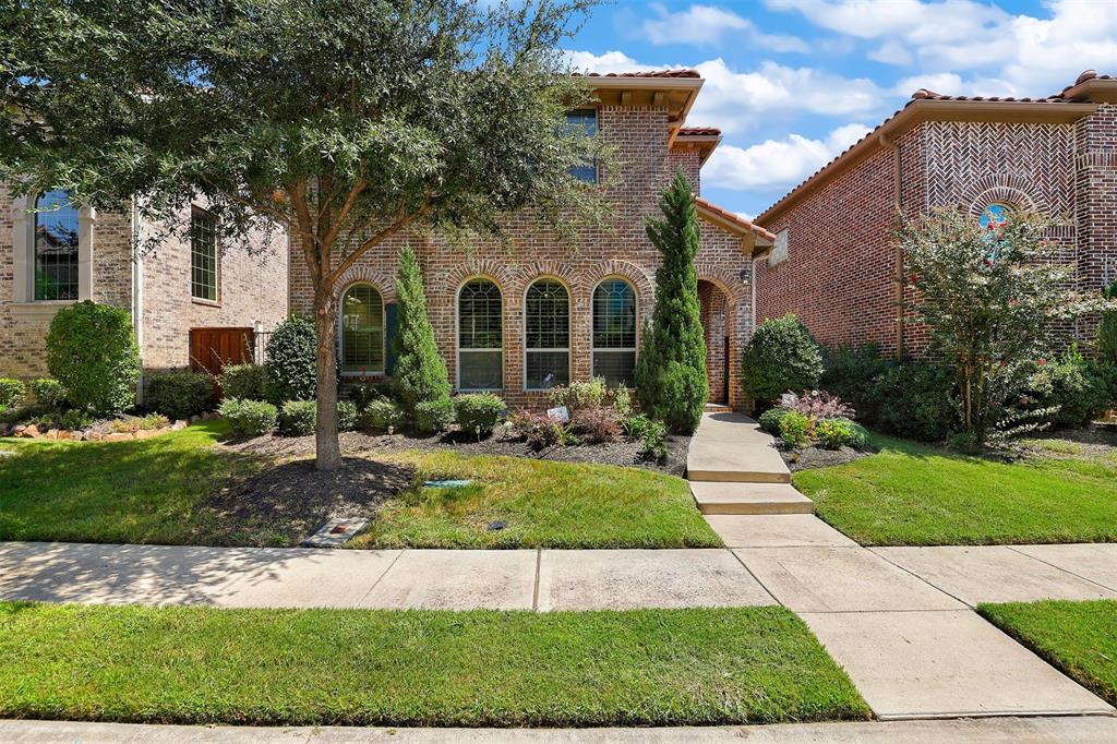 7016 Nueces Drive Irving, TX 75039 - Photo 1 of 1 a front view of house with yard and green space
