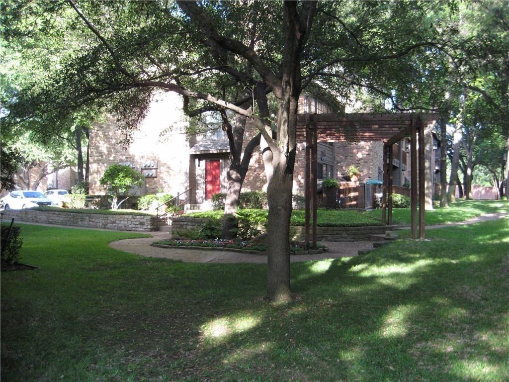 15221 Berry Trail, Unit 405 Dallas, TX 75248 - Photo 4 of 15 a view of a park with tree s