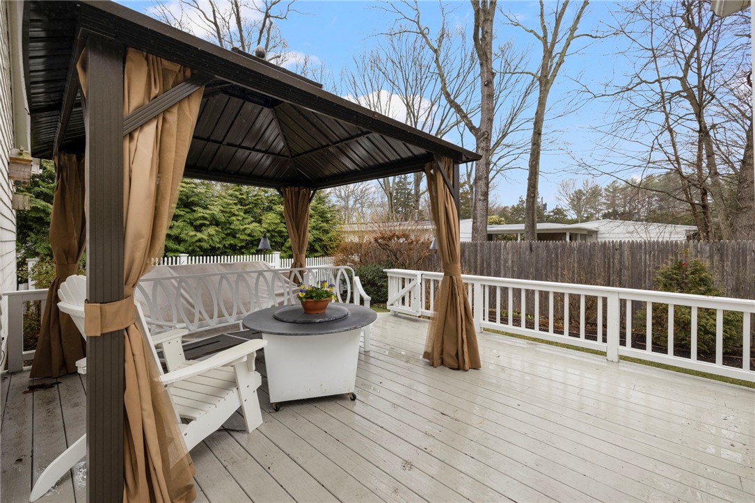 510 Boston Neck Road North Kingstown, RI 02852 - Photo 13 of 43 Nice gazebo for shade and entry onto the fenced in grassy yard.