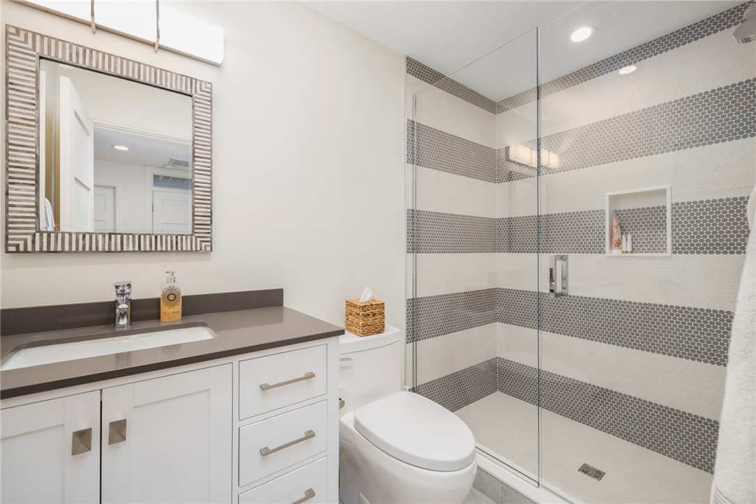 510 Boston Neck Road North Kingstown, RI 02852 - Photo 33 of 43 Love this bathroom! This oversized shower with penny tile is a standout. This room is 4'5" x 8'6".