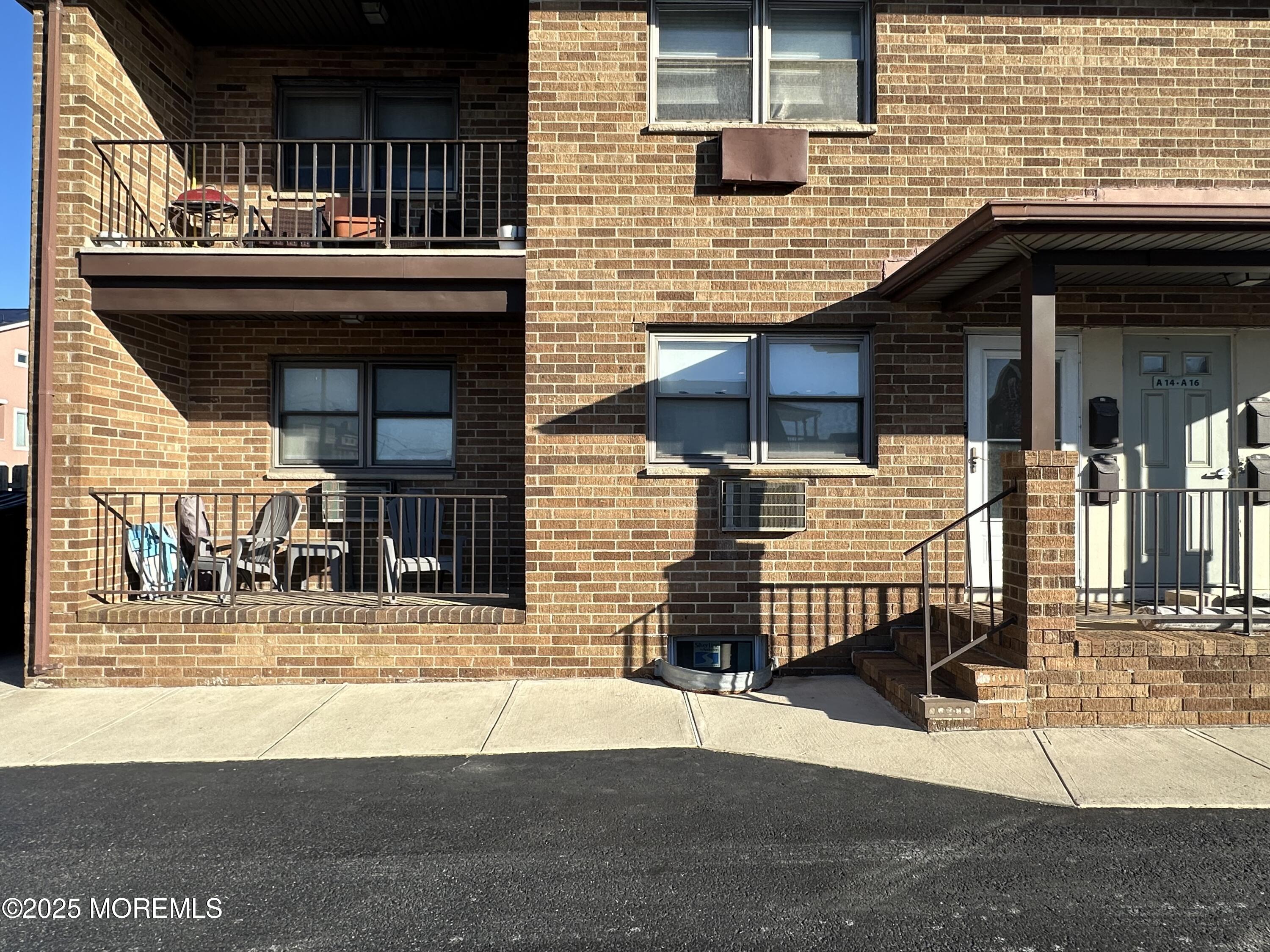1501 Ocean Avenue, Unit A15 Belmar, NJ 07719 - Photo 16 of 17 a view of house with outdoor space