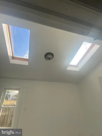 a view of staircase with window