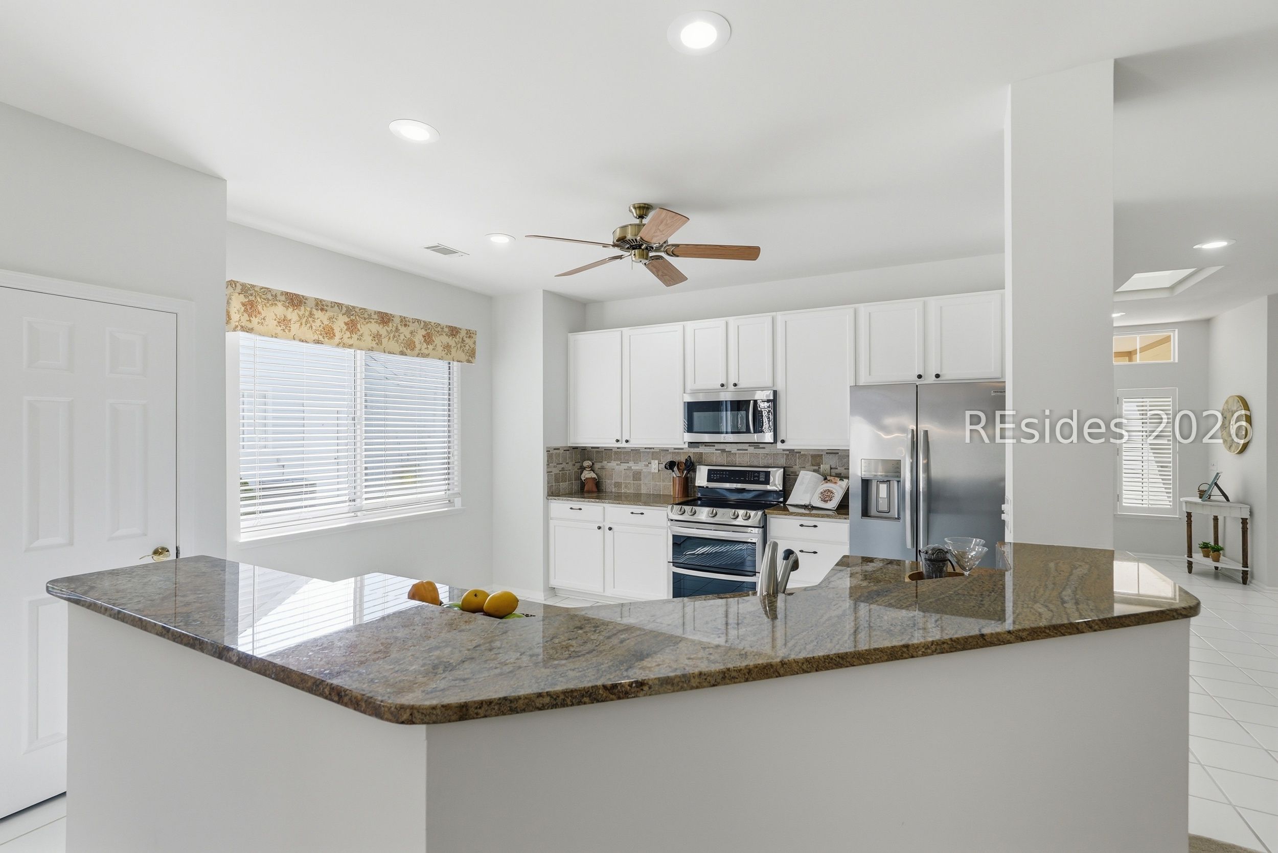 105 Colonel Colcock Court Bluffton, SC 29909 - Photo 16 of 56 Bright, open kitchen at the heart of the home.