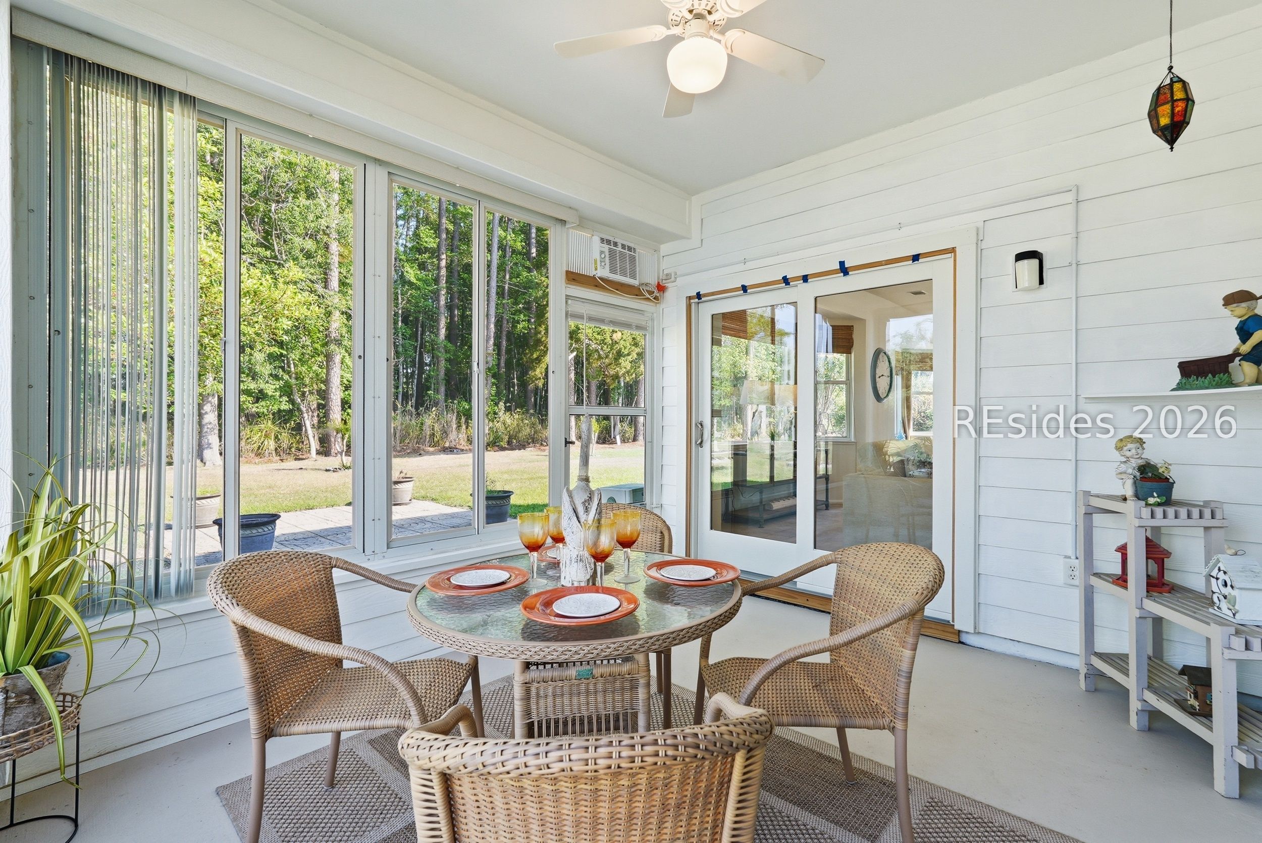 105 Colonel Colcock Court Bluffton, SC 29909 - Photo 28 of 56 Enclosed porch w/ vinyl windows for year-round use