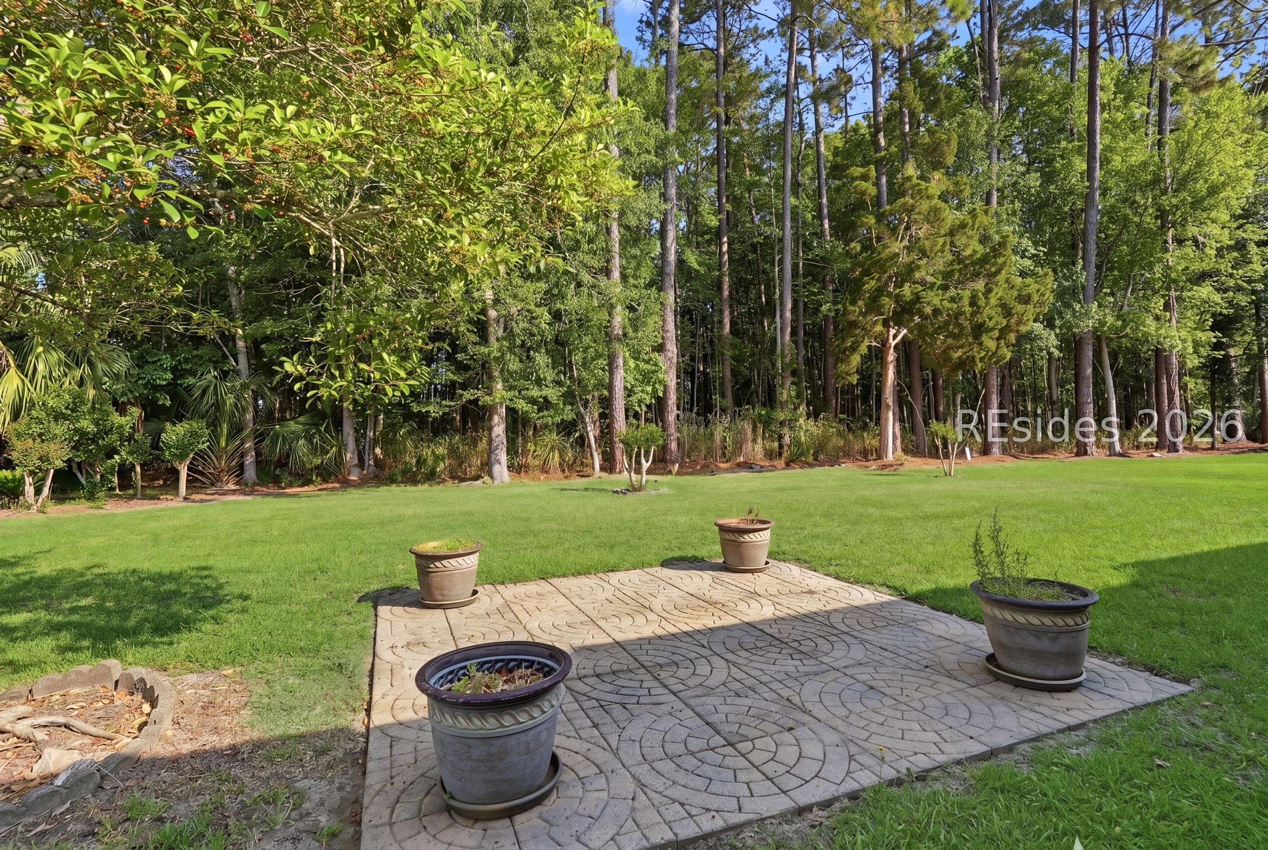 105 Colonel Colcock Court Bluffton, SC 29909 - Photo 29 of 56 Peaceful wooded views from the patio.
