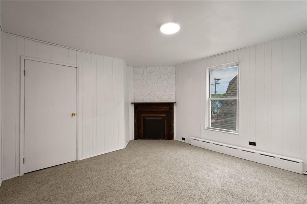 916 2nd Street McKees Rocks, PA 15136 - Photo 20 of 26 a view of an empty room with a window