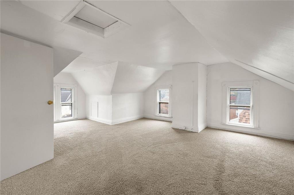916 2nd Street McKees Rocks, PA 15136 - Photo 23 of 26 an empty room with windows and closet