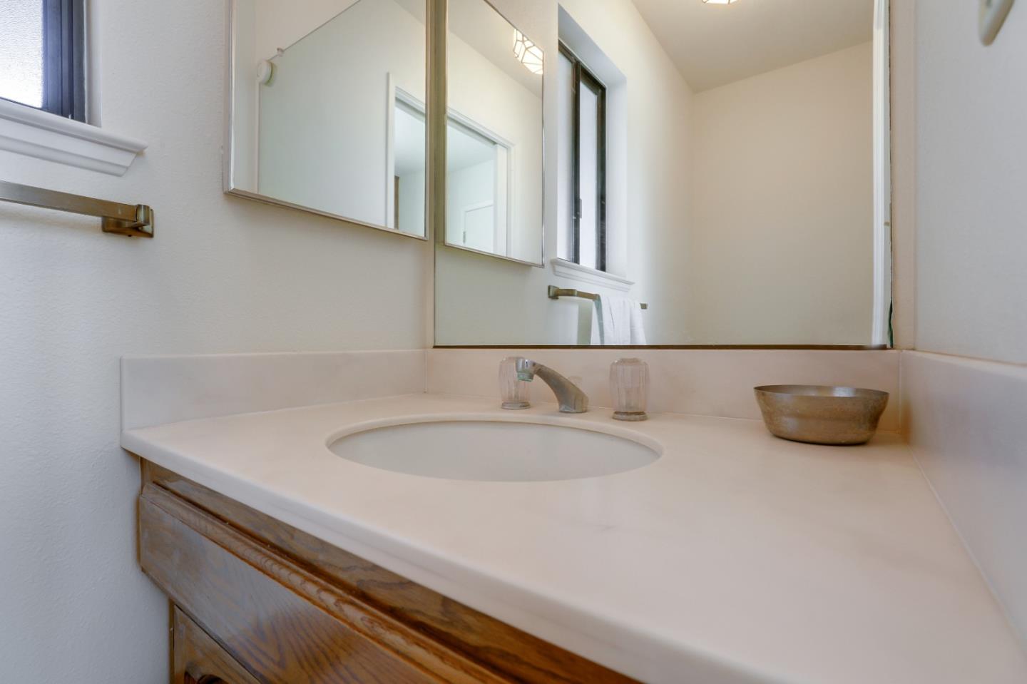 22110 Ranchito Drive Salinas, CA 93908 - Photo 14 of 33 a bathroom with a sink and a mirror
