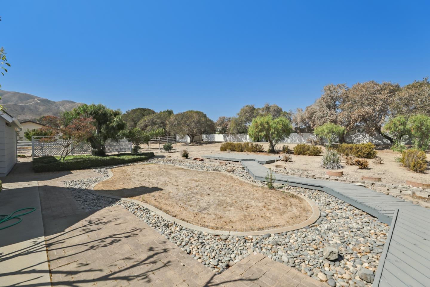 22110 Ranchito Drive Salinas, CA 93908 - Photo 19 of 33 a view of a dry yard with trees