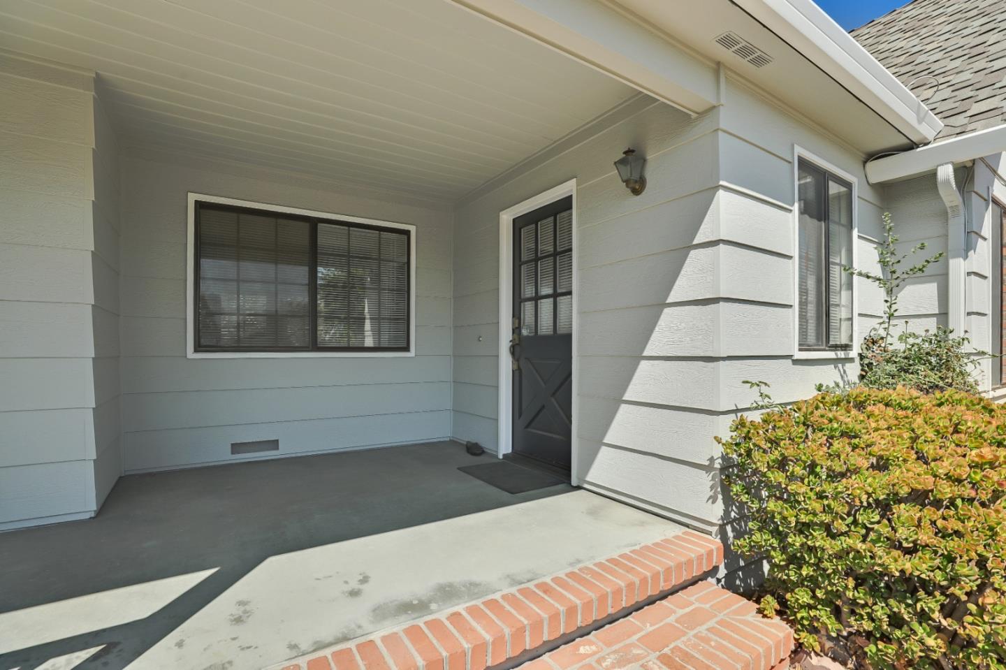 22110 Ranchito Drive Salinas, CA 93908 - Photo 3 of 33 a bedroom with a bed and a window