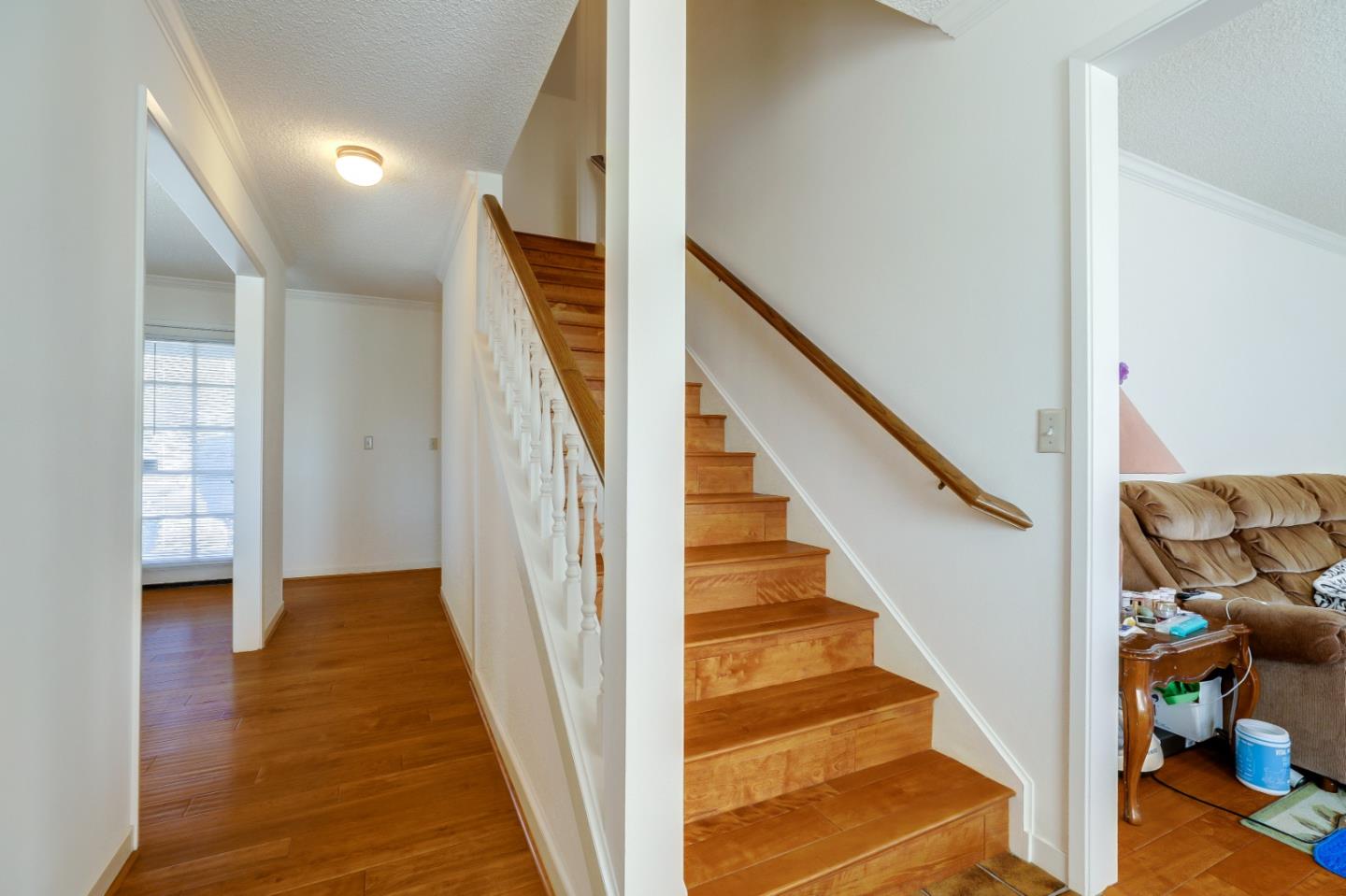 22110 Ranchito Drive Salinas, CA 93908 - Photo 9 of 33 a view of a hallway with wooden floor and entryway