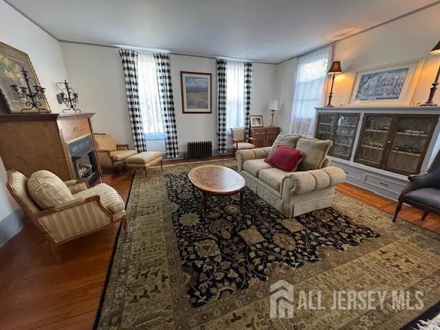 a kitchen with sink refrigerator and microwave