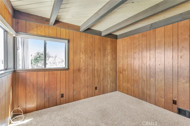 a view of a room with a window and a balcony