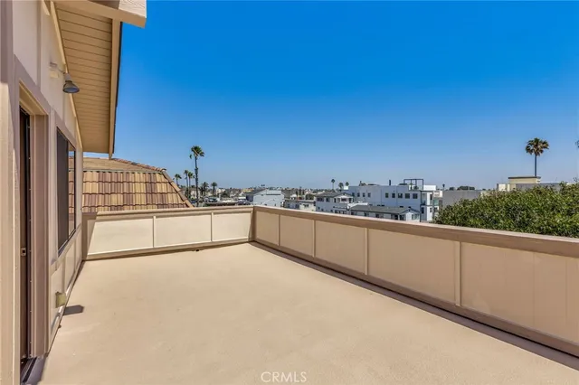 a view of balcony with furniture
