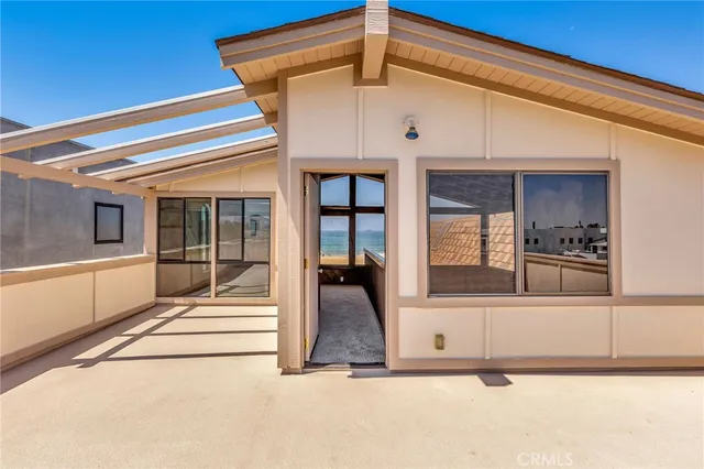 a view of entry way with wooden floor and stairs