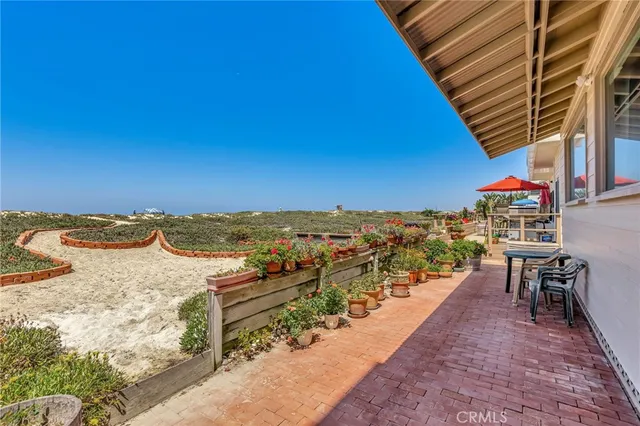 a view of a balcony with an ocean view