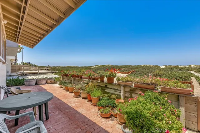 a front view of a building with garden