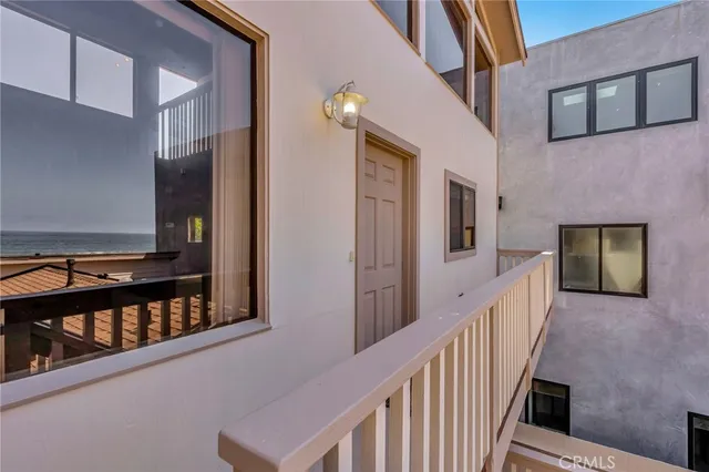 a view of a brick house with wooden floor
