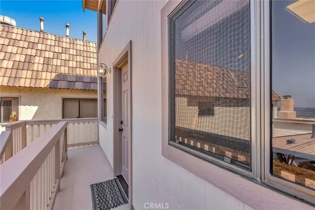 a view of a hallway with a large window