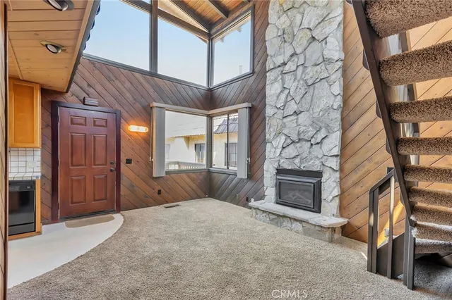 a view of a livingroom with a fireplace
