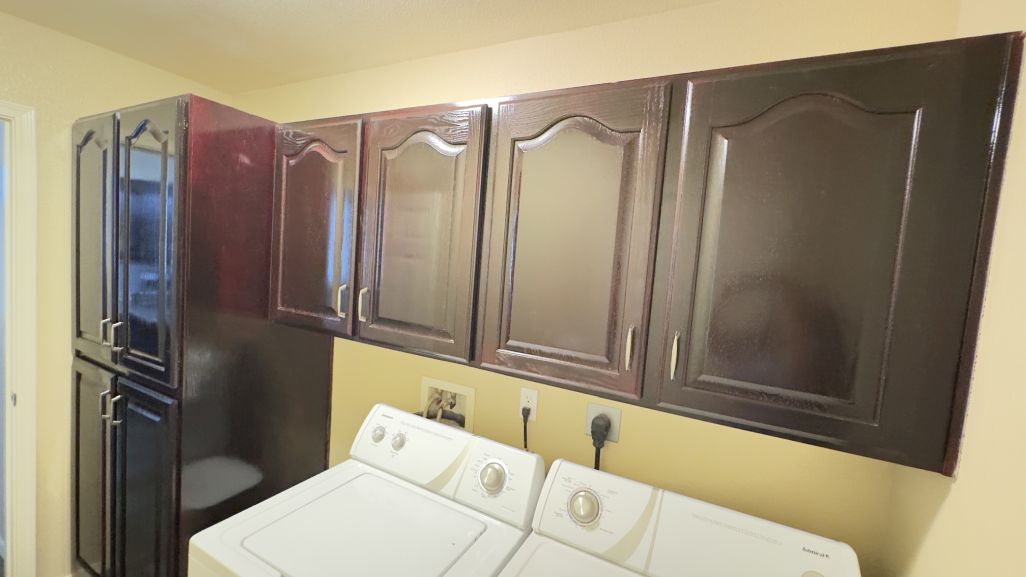 3316 Producers Mine Road Kingman, AZ 86401 - Photo 23 of 35 Dark wood cabinetry featuring arched panel doors and contemporary hardware