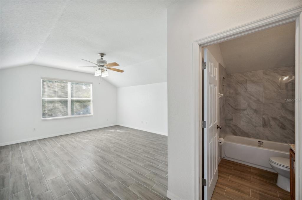 12351 Ridgedale Drive Hudson, FL 34669 - Photo 38 of 54 a view of an empty room with a window