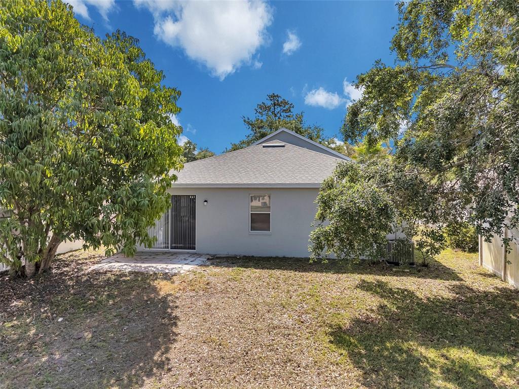 12351 Ridgedale Drive Hudson, FL 34669 - Photo 42 of 54 a view of a house with a yard