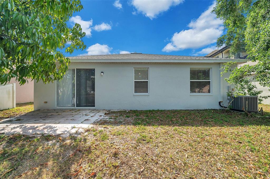12351 Ridgedale Drive Hudson, FL 34669 - Photo 43 of 54 a view of a house with a yard